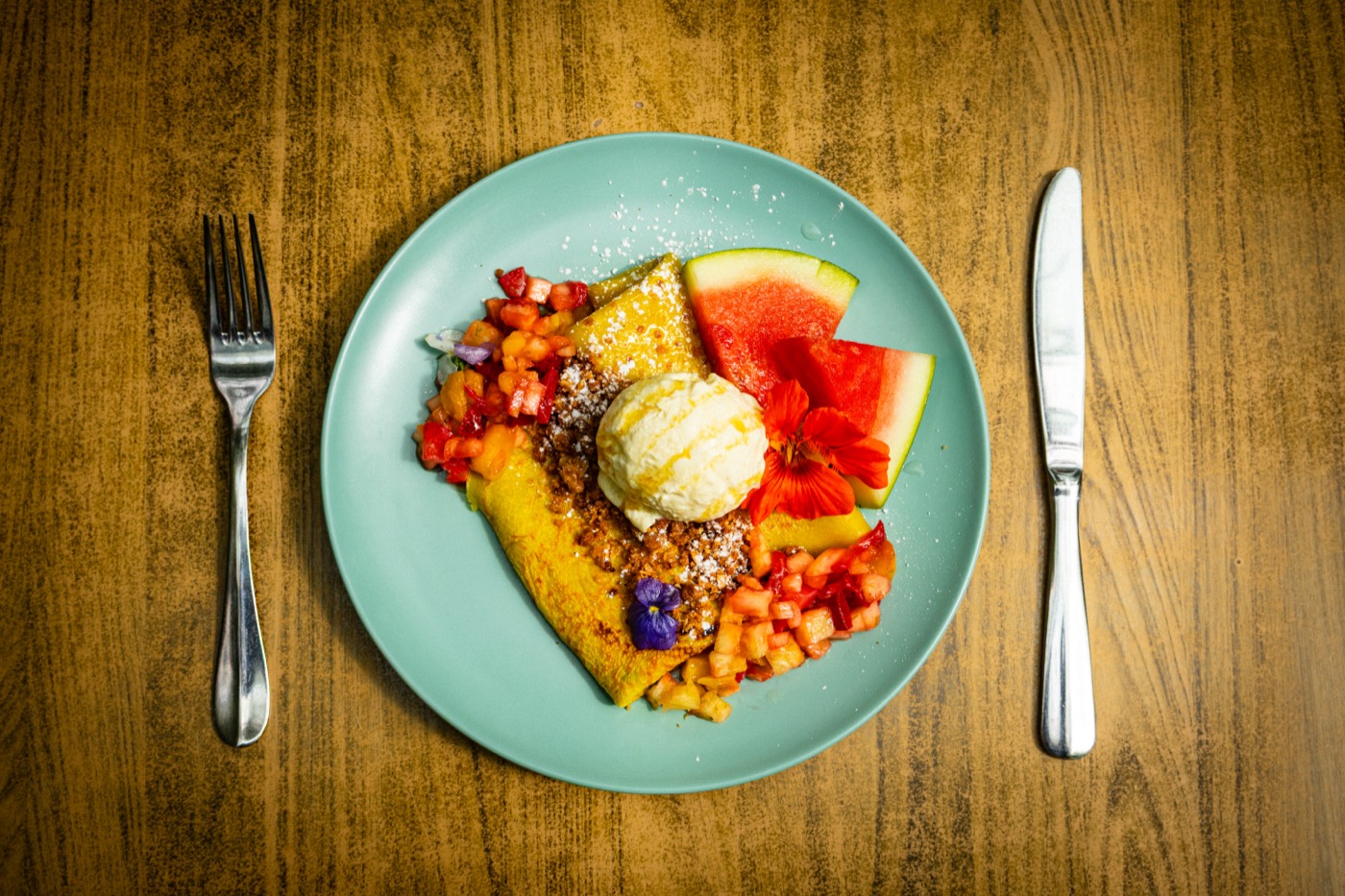 Overhead crêpe dessert plating