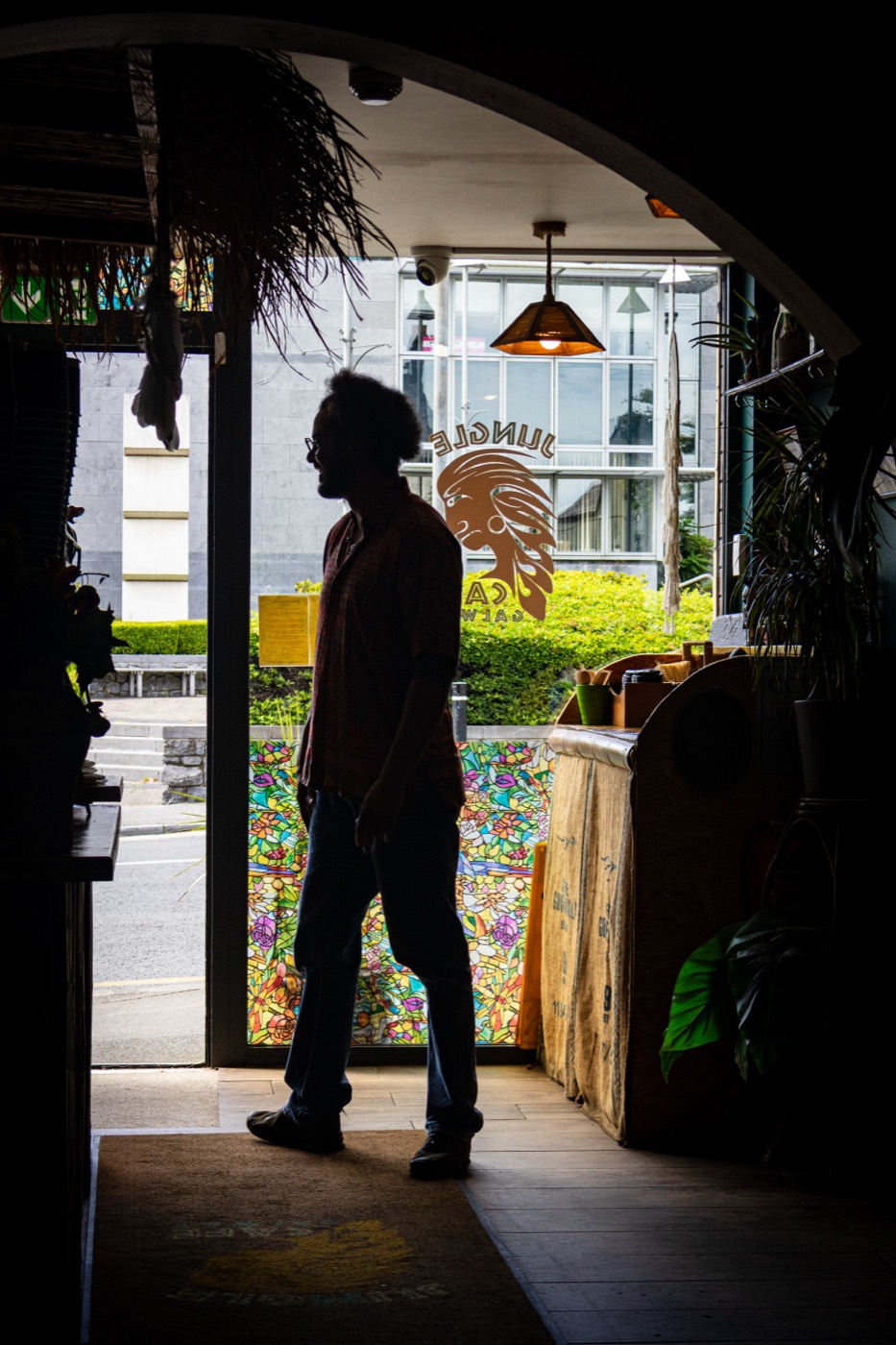 Silhouette in the Jungle Café doorway