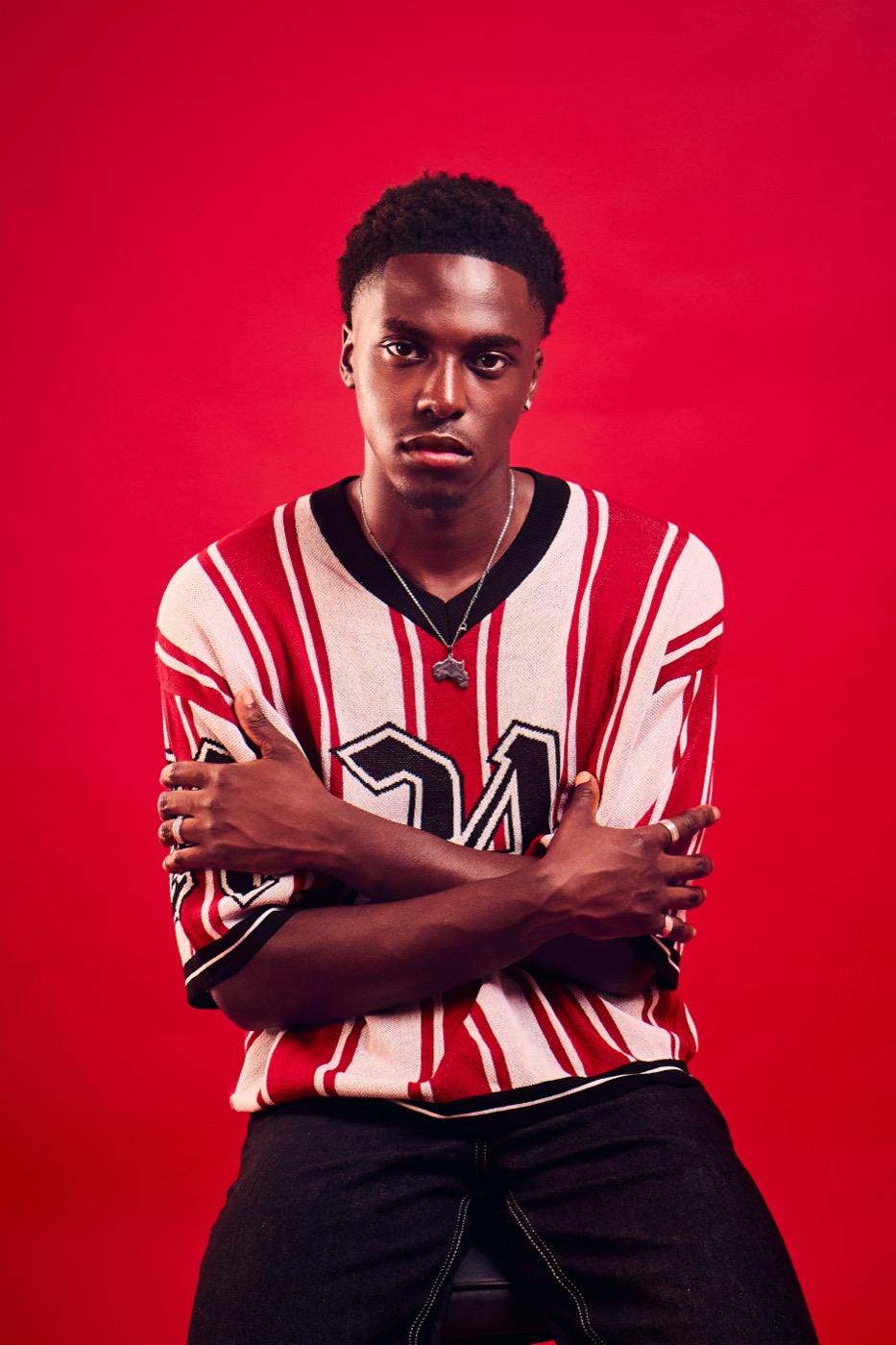 Kubuki streetwear lookbook — striped jersey on red